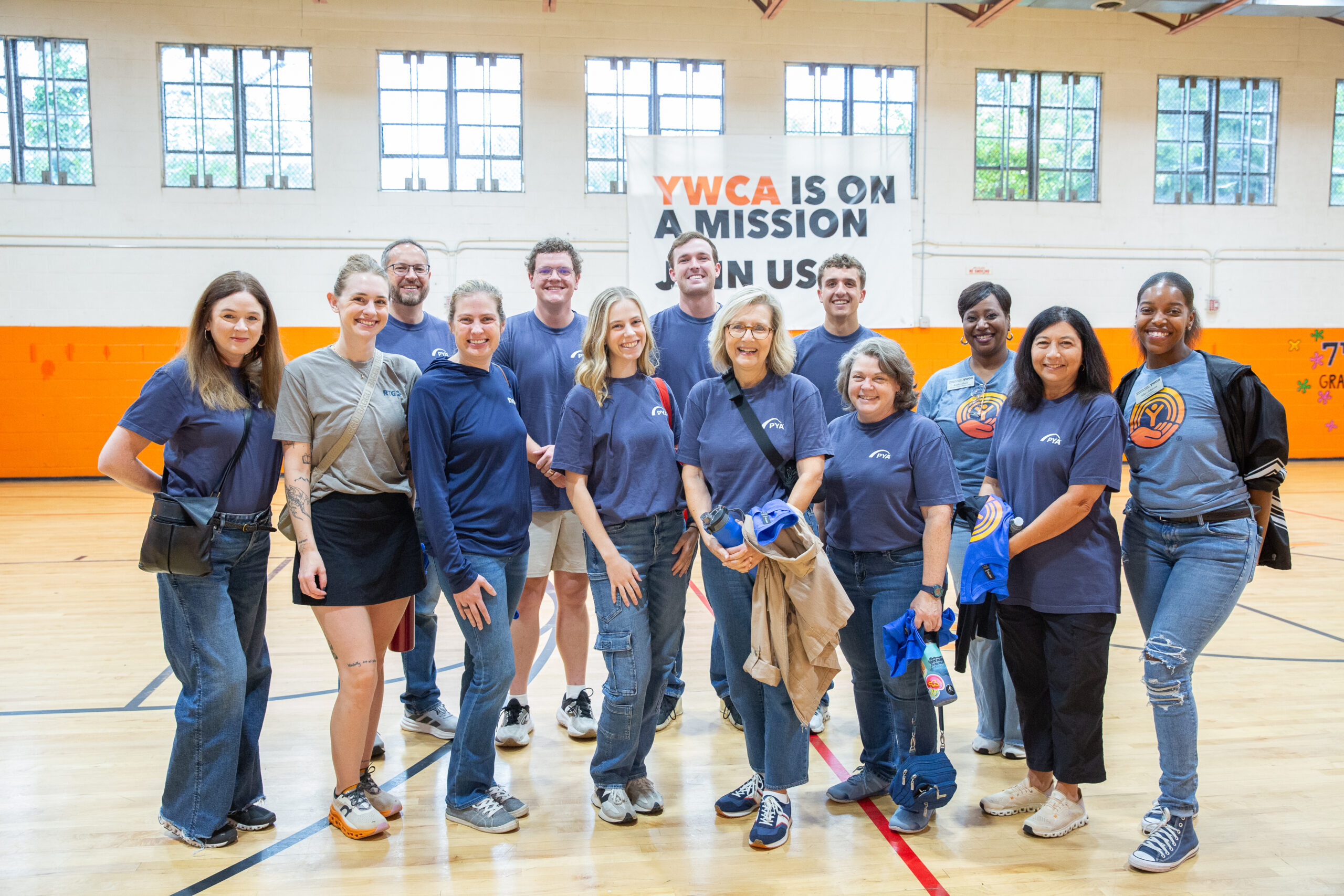 PYA Accountants & Advisors and Realty Trust Group give back at YWCA Phyllis Wheatley Center during Week of Caring.